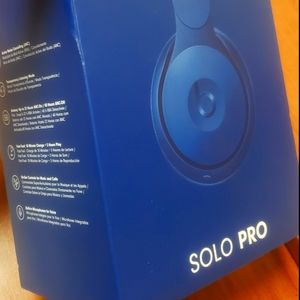 On holdBeats Solo Pro Headphones